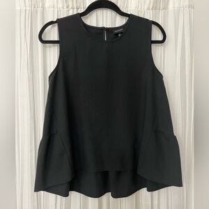 Who What Where black sleeveless top with ruffle on back size small